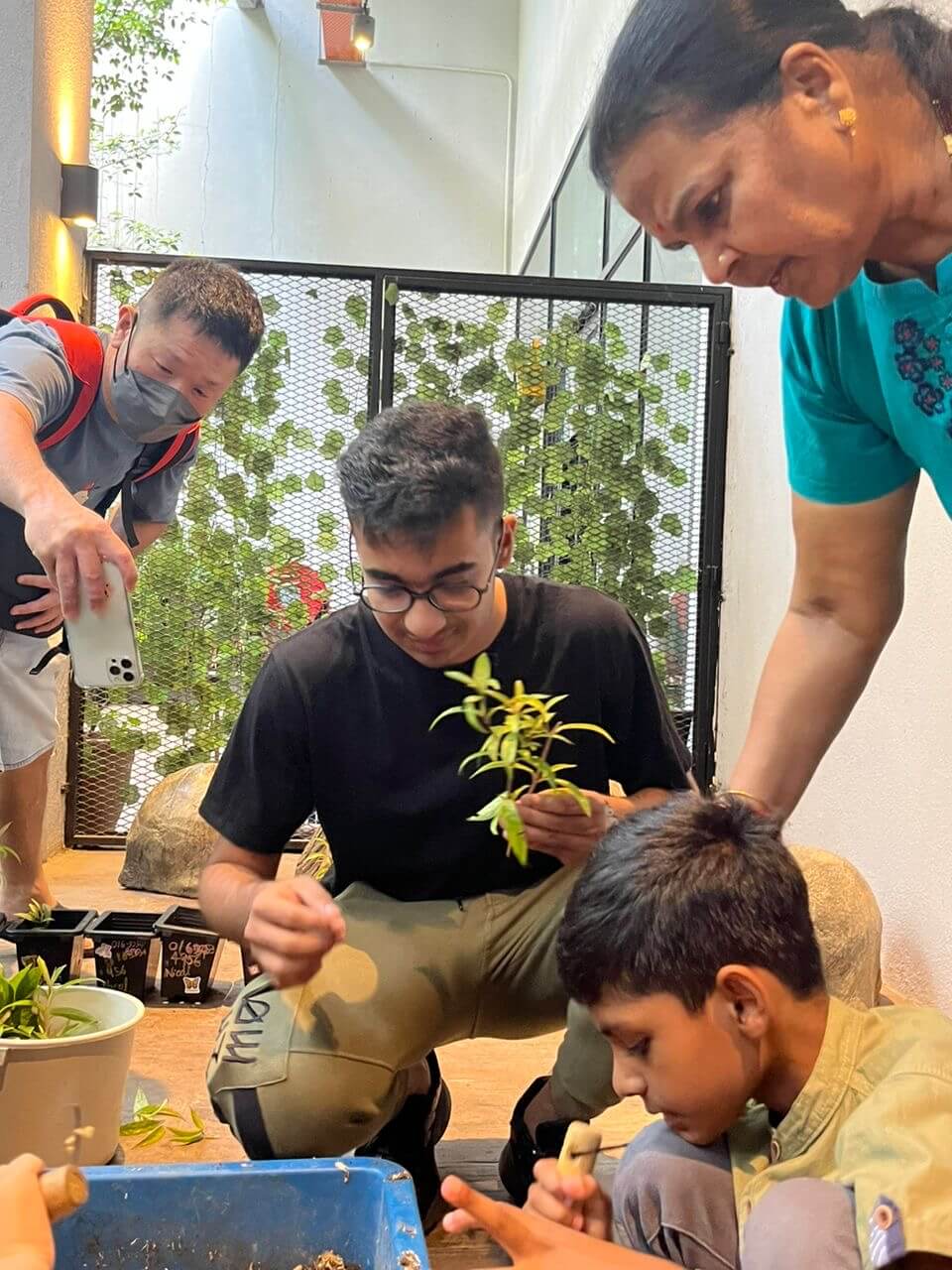 Kamil Hassan volunteering for a kids learning programme